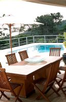 Poolside dining table