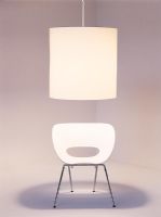 Hanging lamp over a modern chair