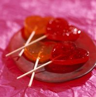 Lollipops in plate close-up