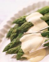 Close-up of asparagus with a white sauce