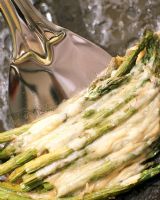 Cooked asparagus with cheese