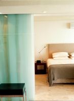 Modern bedroom with panel curtain partition