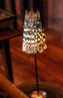Small lamp made of porcupine quills