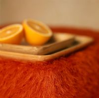 Sliced orange on a wood tray