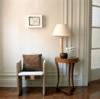 Armchair and side table with table lamp