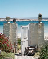 View of beach with gate open