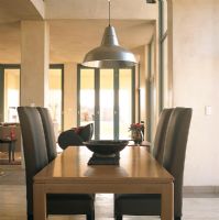 Modern dining room with hanging lamp