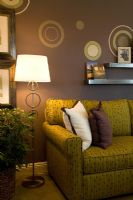 Green sofa and lamp