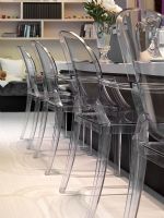 Detail row of clear plastic chairs