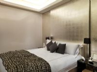 Modern bedroom with gold wall