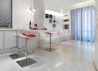 White modern living and dining area