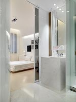 Marble sink outside modern bedroom
