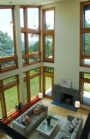 High angle view of contemporary living room with several windows