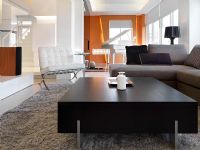 Low angle view of modern black coffee table in living room