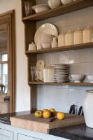 Worktop and shelving unit in country kitchen