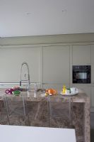 Modern kitchen with marble breakfast bar 