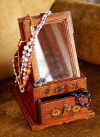 Vintage jewelry box with beaded necklaces