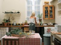 Woman working in kitchen
