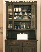 Tableware in a wooden china cabinet