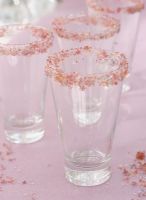 Decorated glasses on table