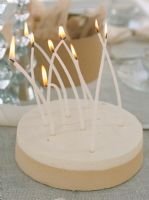 Burning candles in cake