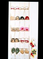 Hanging shoe caddy with pairs of shoes