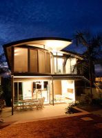 Modern home exterior at night