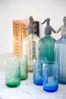 Colourful glassware and soda syphons