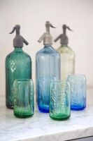 Colourful glassware and soda syphons