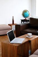 Laptop on table in living room 