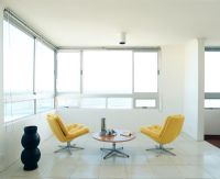 Seating area with yellow chairs