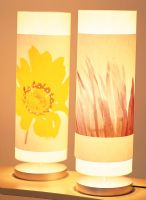 Two floral lamps side by side