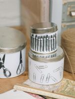 View of tins with map and ruler