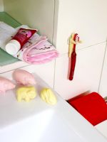 Sink in modern bathroom with novelty soaps