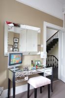 Mirrored dressing table in bedroom