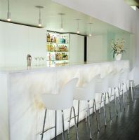 View of bar with bar stools