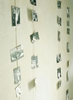 Photographs hanging on a wall 