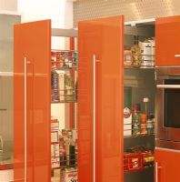 View of groceries in open cabinet