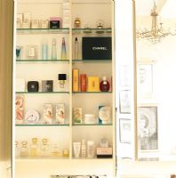 Cosmetics on glass shelves 