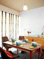 Modern dining room with vintage table