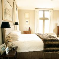 Bedroom with beige wallpaper