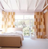 Golden bedroom with double bed