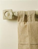 Close-up of a curtain and curtain rod
