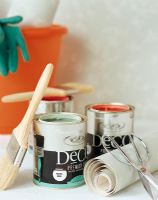 Paint cans with paintbrush