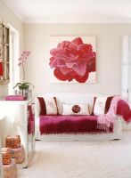Modern living room with large painting of flower