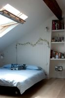 Contemporary bedroom in converted loft