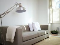 Beige sofa in contemporary living room