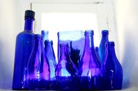 Collection of blue glass bottles 