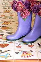Wellington boots on tiled floor 