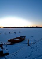 Boat on a frozen lake